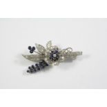 A SAPPHIRE AND DIAMOND FOLIATE SPRAY BROOCH set overall with circular-cut sapphires and diamonds
