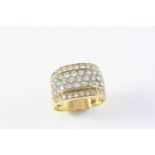 A DIAMOND COCKTAIL RING set overall with circular-cut diamonds, in 18ct yellow gold. Size P 1/2