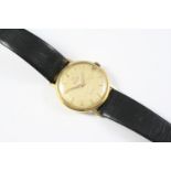 A GENTLEMAN'S GOLD KINGMATIC WRISTWATCH BY MOVADO the signed circular dial with dagger quarters