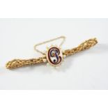 A GOLD, ENAMEL AND PEARL BRACELET the gold link bracelet mounted with an oval section of white