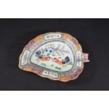 CHINESE FAMILLE ROSE DISH a leaf shaped dish with stalk handle, painted in strong enamels with