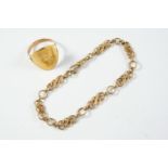 A 9CT GOLD FANCY LINK BRACELET 18.5cm long, 7.2 grams, together with a gold sovereign, worn and