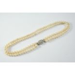 A DOUBLE ROW GRADUATED CULTURED PEARL NECKLACE the pearls graduate from approximately 4.8mm to 6.5mm