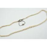 A SINGLE ROW GRADUATED CULTURED PEARL NECKLACE the pearls graduate from approximately 3.3mm to 5.8mm