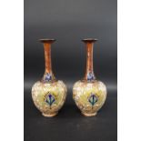 LARGE PAIR OF ROYAL DOULTON VASES the vases with a long narrow neck and bulbous body, with green and