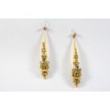 A PAIR OF VICTORIAN DROP EARRINGS each with applied foliate and scrolling decoration