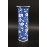 CHINESE BLUE & WHITE PORCELAIN VASE a late 19thc sleeve vase painted with prunus blossom on a blue