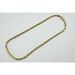 A 9CT GOLD FANCY LINK NECKLACE 39.5cm long, 21.4 grams