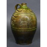 MICHAEL CARDEW WINCHCOMBE JUG a large green glazed jug or flagon with simple leaf design, with a