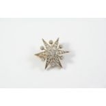 A VICTORIAN DIAMOND STAR BROOCH PENDANT set overall with graduated old cushion-shaped and rose-cut
