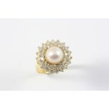 A MABE PEARL AND DIAMOND CLUSTER RING the mabe pearl is set within a double surround of circular-cut