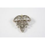 A LATE VICTORIAN DIAMOND AND PEARL SET BROOCH the foliate openwork design is mounted with old