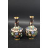 PAIR OF 19THC CHINESE CLOISONNE VASES a pair of bulbous vases, designed with various flowers,