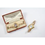 A LADY'S GOLD WRISTWATCH the white enamel dial with Arabic numerals, with outer enamel chapter ring,