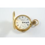 AN 18CT GOLD HALF HUNTING CASED POCKET WATCH BY J.W. BENSON, LONDON the signed white enamel dial