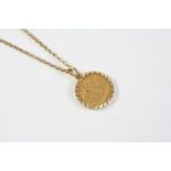 A GOLD HALF SOVEREIGN 1898, in a 9ct gold pendant mount and on a 9ct gold circular link chain, total
