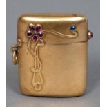 ART NOUVEAU GOLD VESTA a gold vesta with a sinuous floral design, with a flower head inset with