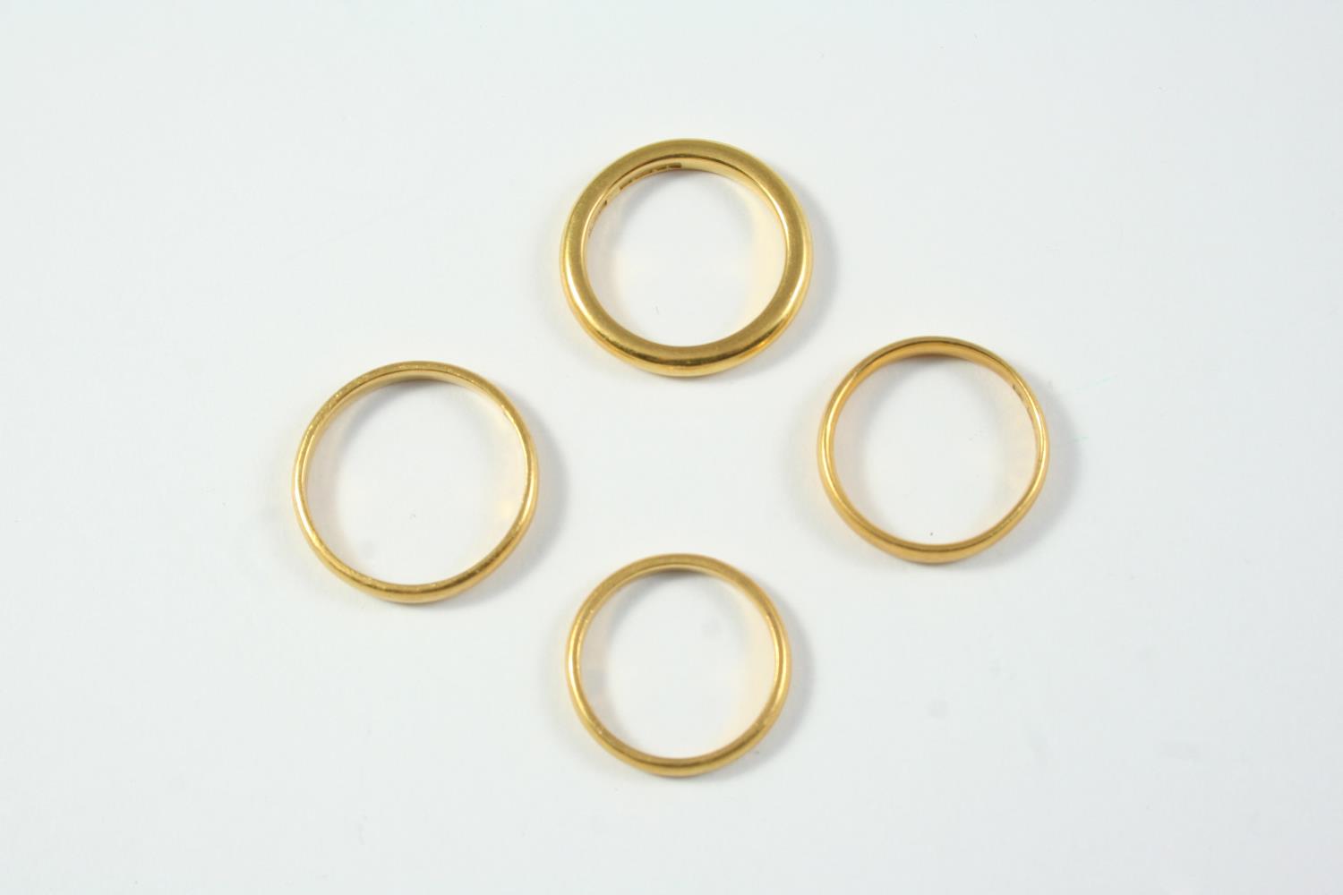 FOUR 22CT GOLD WEDDING BANDS 17.7 grams