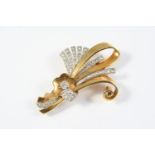 A FRENCH DIAMOND AND GOLD FOLIATE SPRAY BROOCH set with a circular-cut diamond and overall with