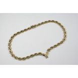 A 9CT GOLD V-SHAPED FANCY LINK NECKLACE with concealed clasp, 42.5cm long, 30 grams