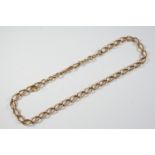A 9CT GOLD OVAL LINK WATCH CHAIN 43cm long, 40 grams