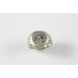 AN EARLY 18TH CENTURY CONTINENTAL SILVER MEMENTO MORI RING engraved with a skull. Size L