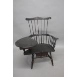 D. R. DIMES - AMERICAN WINDSOR CHAIR The Comb back writing arm Windsor chair, with a saddle seat and