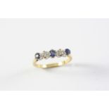 A SAPPHIRE AND DIAMOND FIVE STONE RING the three circular-cut sapphires are set with two circular-