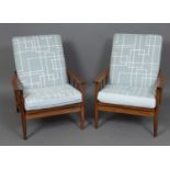 PAIR OF MID CENTURY ARMCHAIRS a pair of teak armchairs with curved arms and spindle supports, with