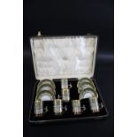 LIMOGES CASED & SILVER MOUNTED COFFEE SET - GOLDMSITHS & SILVERSMITHS a Limoges porcelain coffee set