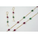 A RUBY, EMERALD AND CULTURED PEARL NECKLACE the gold chain is mounted with ruby and emerald beads,