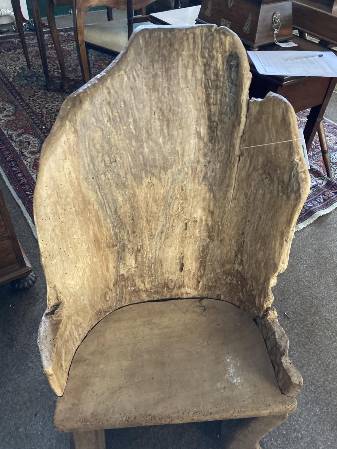 A PRIMITIVE 'DUG OUT' TYPE CHAIR. An unusual 'dug out tree trunk' type chair with solid seat, - Image 3 of 8