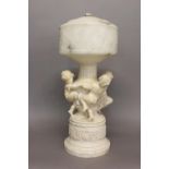 A LARGE ALABASTER AND MARBLE LAMP SIGNED L. SCHEGGI. The large lamp with a carved white marble