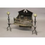 A GEORGE III STYLE FIRE GRATE. With an architectural cast back, open fire basket with decorative