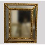 A PAIR OF CONTINENTAL 18TH CENTURY STYLE MIRRORS. Each with central rectangular bevel
