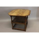 AN 18TH CENTURY STYLE YEW WOOD 'MONKS' TABLE. With a rectangular top with canted corners, on