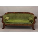 A 19TH CENTURY FRENCH EMPIRE STYLE SETTEE. With a broad Mahogany show wood frame with satinwood