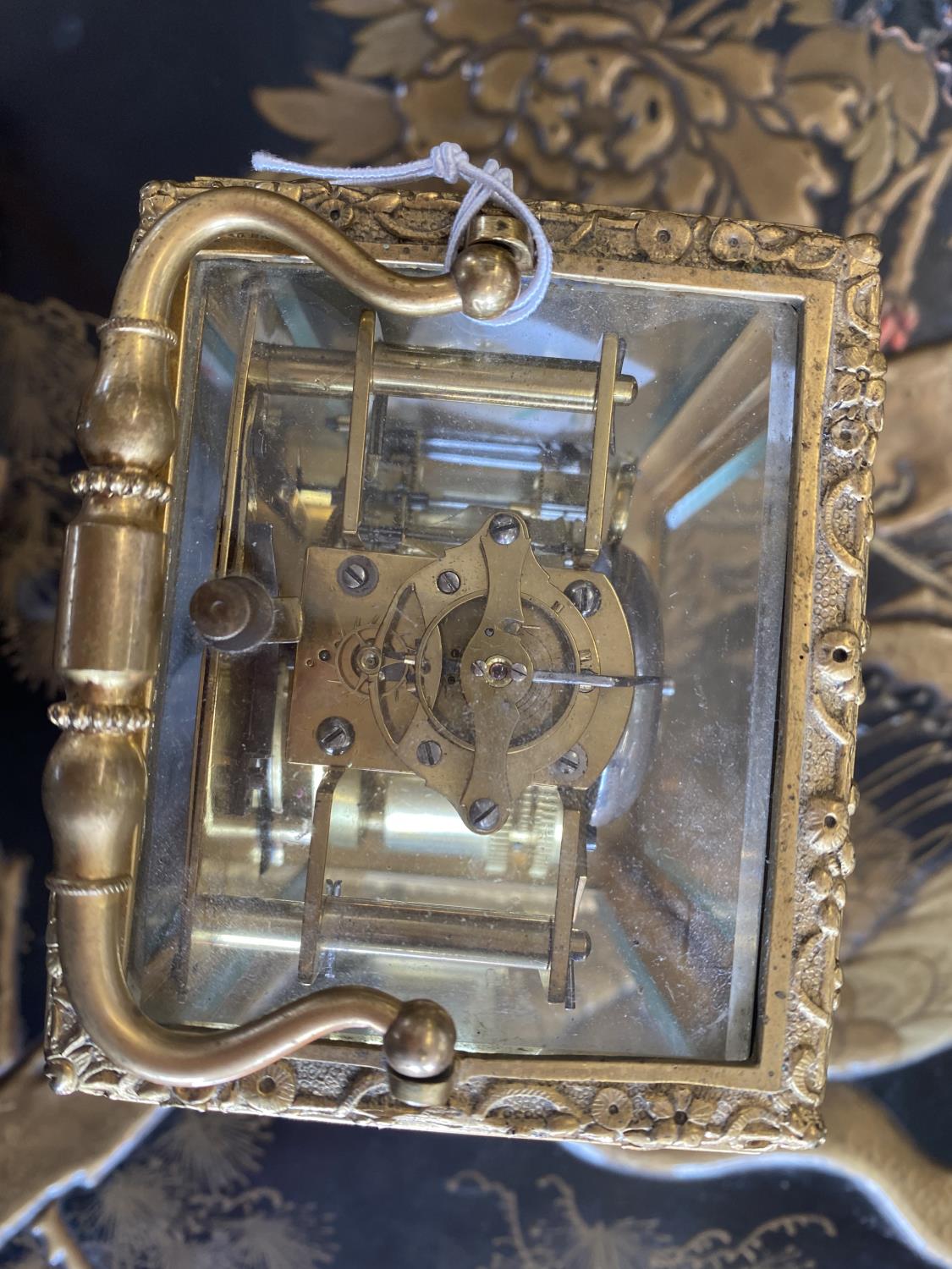 AN ELABORATE GILT BRASS CARRIAGE CLOCK BY HENRY OF PARIS. With a white enamelled dial with Roman - Image 14 of 14