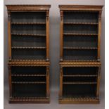 A FINE PAIR OF REGENCY ROSEWOOD OPEN FRONTED BOOKCASES. With decorative ripple mouolded cornices
