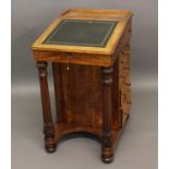 A WILLIAM IV SATINWOOD AND MAHOGANY DAVENPORT with fitted interior, side drawers and slides, the