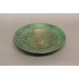 AN UNUSUAL AMERICAN GREEN PAINTED BOWL. A turned wooden bowl with original green painted finsih with