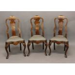 A SET OF FOUR DUTCH MARQUETRY DINING CHAIRS. With tall 'Queen Anne' style backs with allover