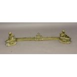 A 19TH CENTURY FRENCH GILT BRASS FIRE KERB. Of neo classical design with central raised scrolling