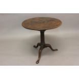 A GEORGE II MAHOGANY 'BIRD CAGE' TRIPOD TABLE. With a circular one piece revolving top on a '