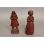 AN USUAL PAIR OF RED WAX FIGURES, POSSIBLY 17TH CENTURY. Two red wax figures of a lady and gentleman