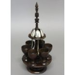 A FINE EARLY 19TH CENTURY TURNED LABURNUM EGG CRUET. With a central turned finial/handle above a