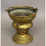 AN 18TH CENTURY BRASS SITULA MARKED FOR BRUGES. The bucket shaped form with swing handle above a rim