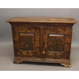 A CONTINENTAL PAINTED PINE CUPBOARD. With a rectangular overhanging top and moulding above twin