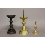 A HEAVY BRASS 17TH CENTURY STYLE PRICKET CANDLESTICK. A heavy brass candlestick with tall pricket,