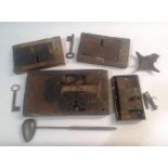 FOUR 17TH CENTURY AND SIMILAR DOOR LOCKS AND OTHER ITEMS. Four 17th century and later door locks,
